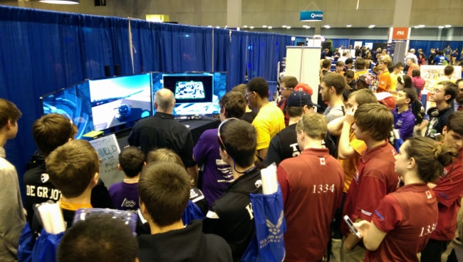 Students crowded into our booth at the competition.