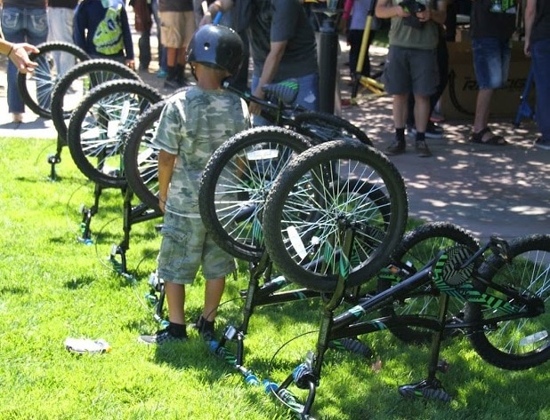 Children were eager to get their hands on their new bikes.