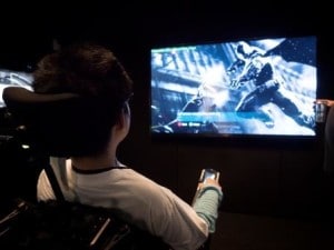 Make-A-Wish participant Alan plays Batman: Arkham Origins