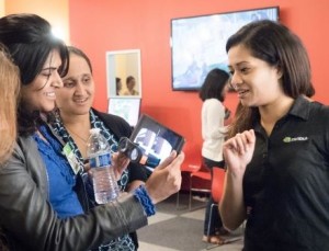 Girl Geek Dinner attendees try out a demo with Google cardboard and an NVIDIA tablet.