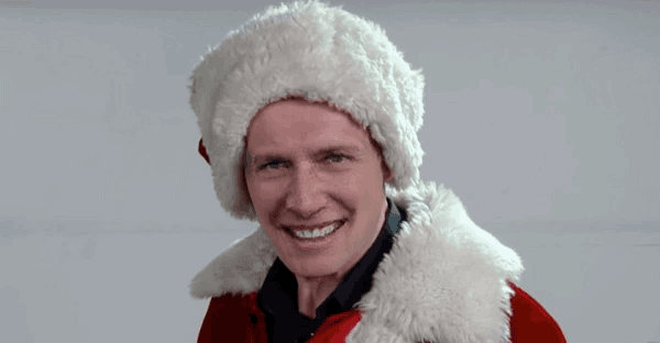 A deep learning smiling bot helps Liam Neeson look more like Santa.