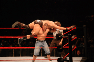 John Cena, clearing out some room in the ring.