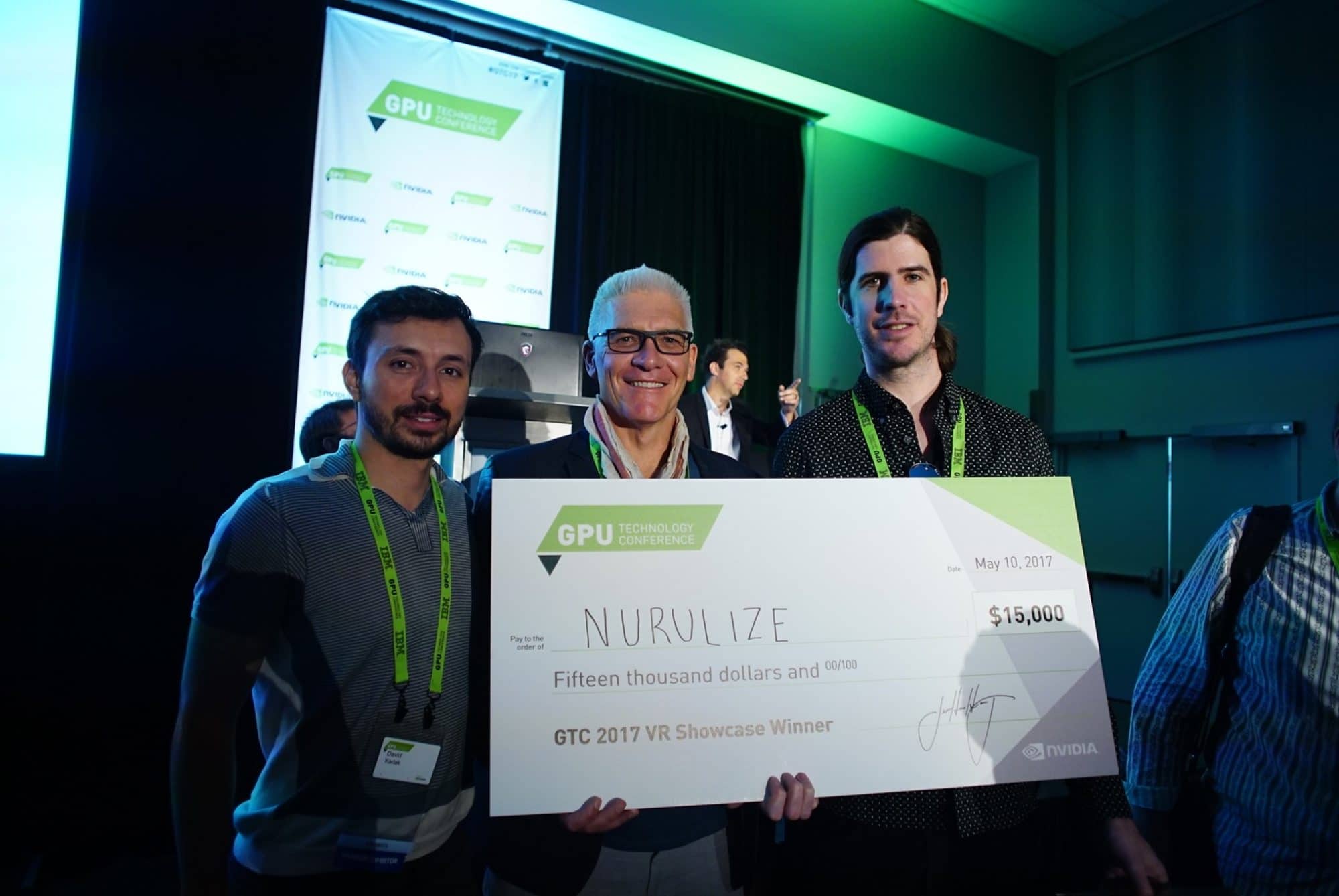 Nurulize founders accept their VR Content Showcase award.