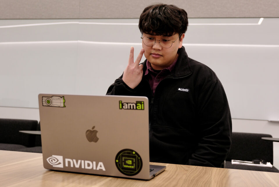 person signing the word "vegetable" using Signs AI platform