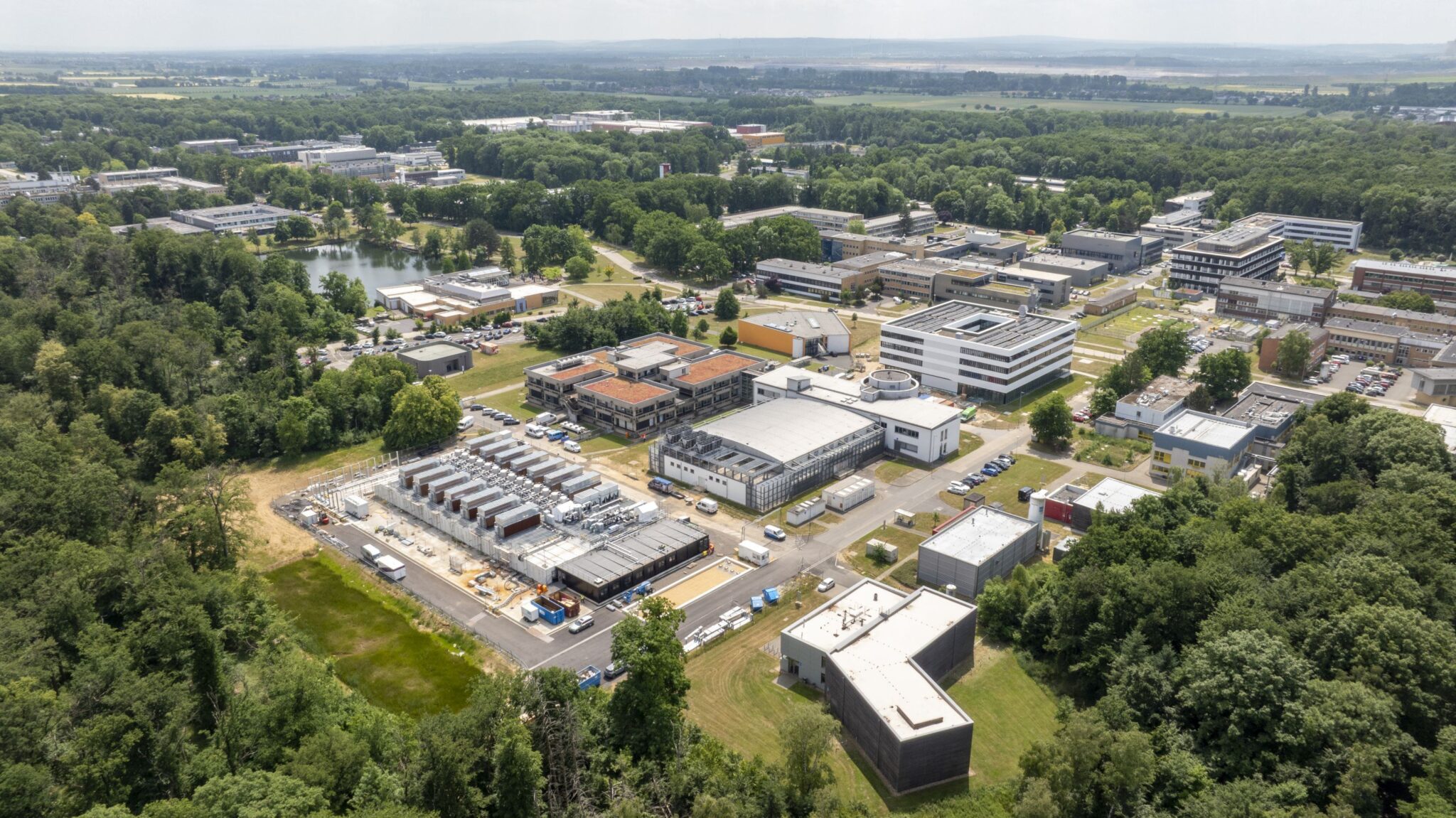 Aerial view of the Jülich Supercomputing Centre campus, including the modular data center, on the far left, which houses JUPITER.