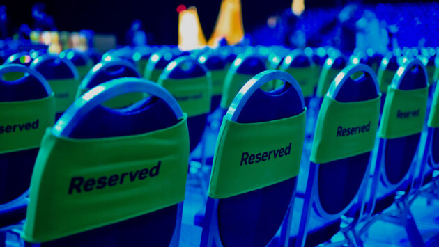 rows of chairs with reserved labels