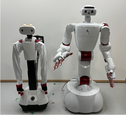 Pictured are two Moonshot robots AIREC-Basic (left) and AIREC-Basic (right).