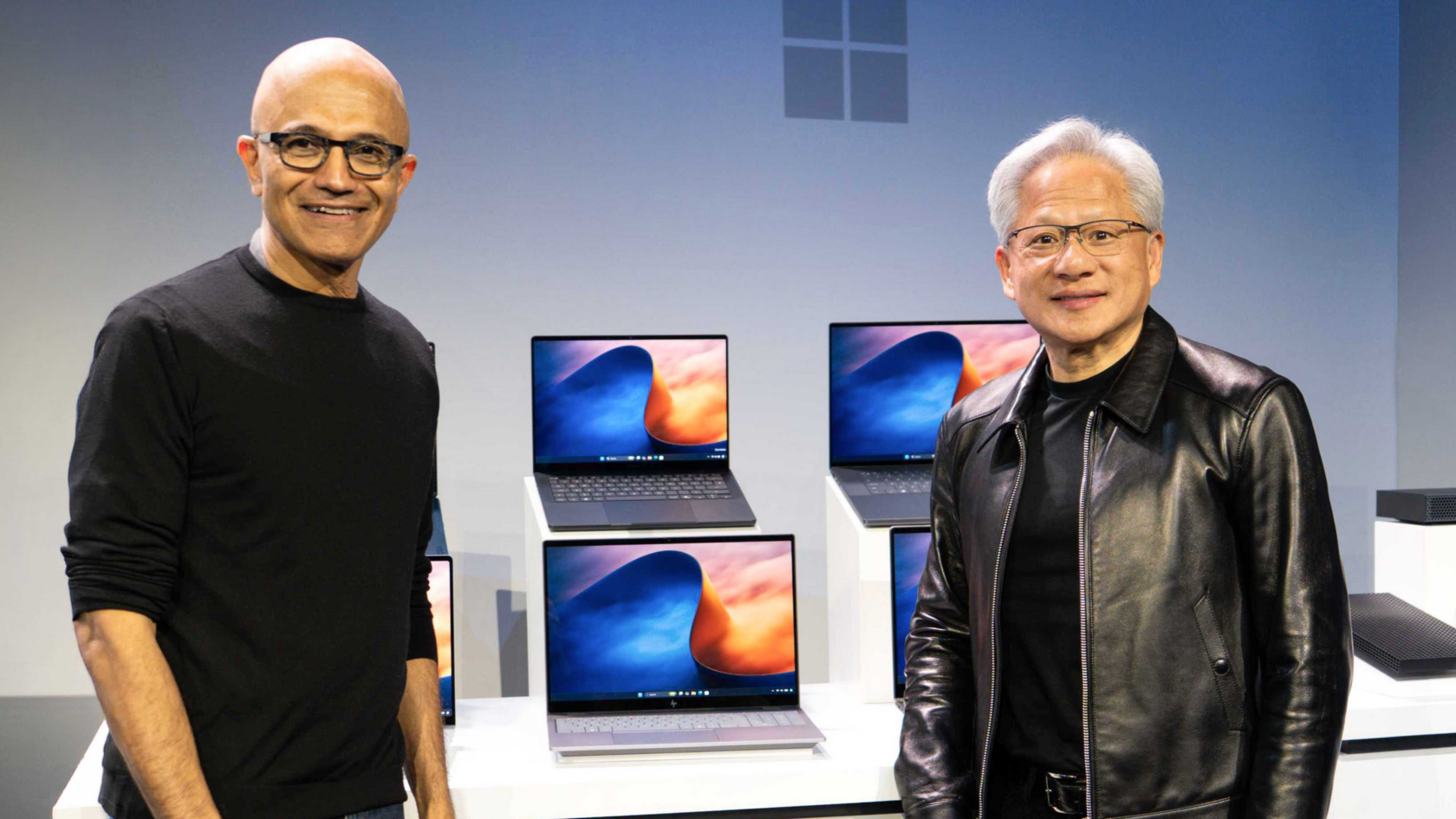 Nvidia and Microsoft executives on stage at an event introducing RTX Spark AI PCs